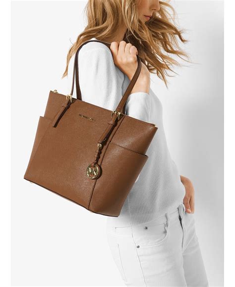 michael kors jet set punkt ost west top zip tote|Michael Kors jet set.